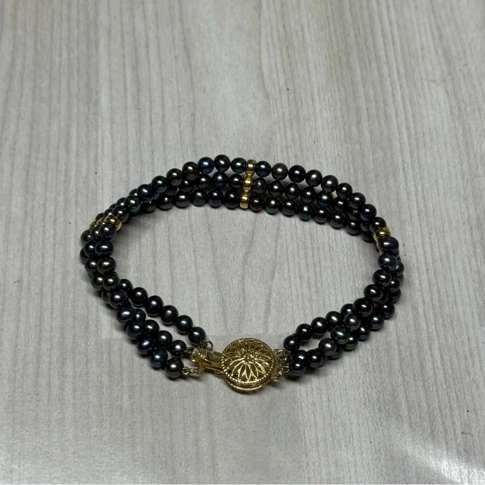 14k Yellow Gold Elegant Black Natural Multi-Strand Pearl Bracelet.